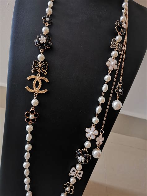 replica chanel pearl necklace uk|chanel inspired long pearl necklace.